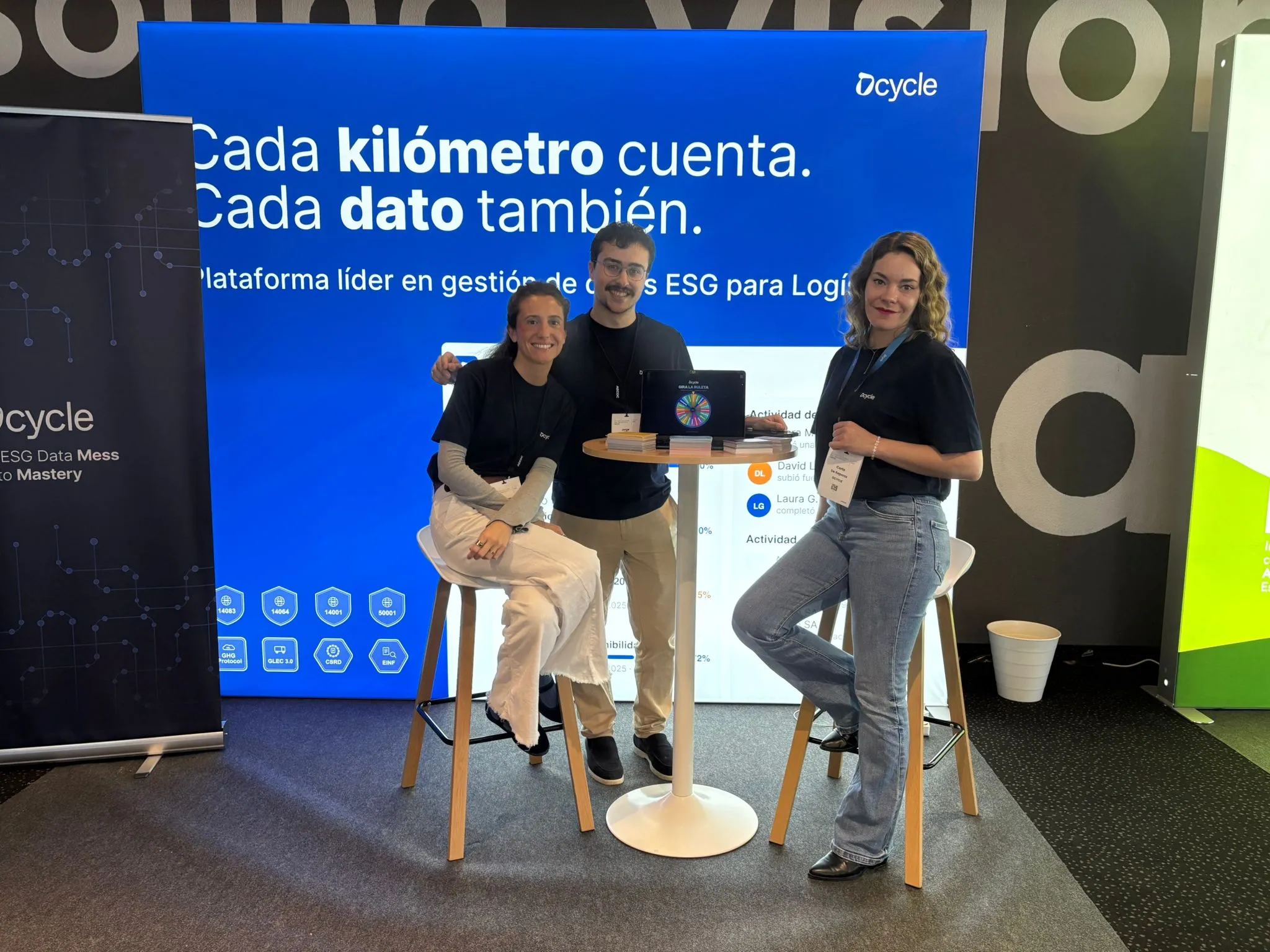 Dcycle team member in conversation with an attendee at AECOC Transport Forum