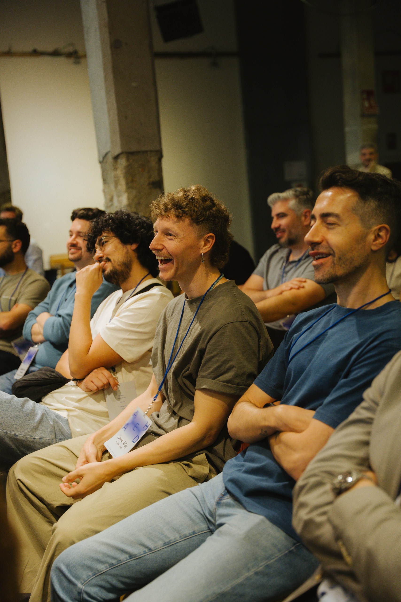 Audience laughing and engaged during a presentation at Ahead Madrid 2026
